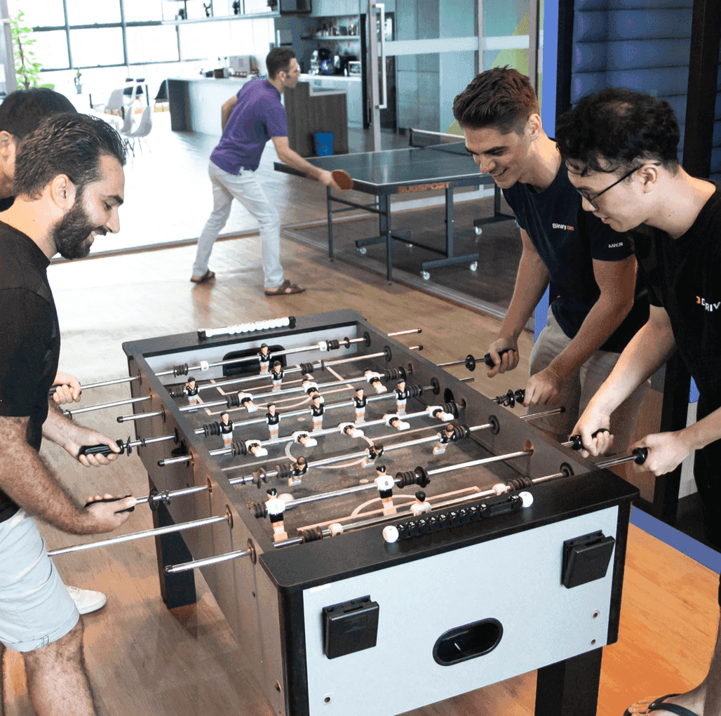 Boys playing foosball