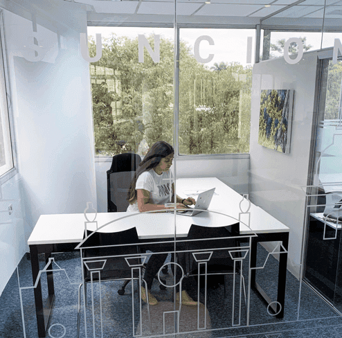 Girl working in her cubicle